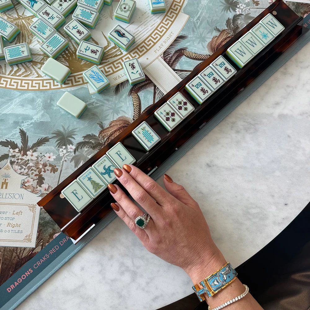 Mahjong tiles on a marble table